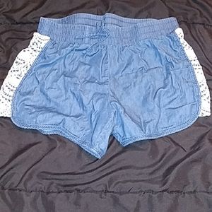 Blue shorts with lace on the side